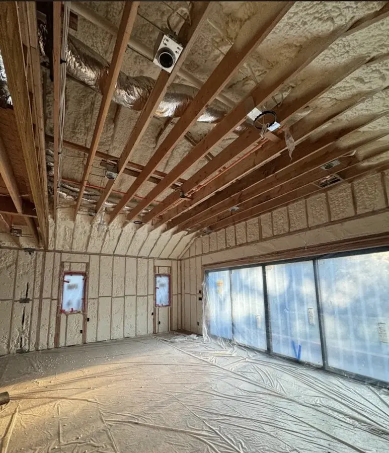 Interior walls and ceiling insulated with spray foam during new construction in Lufkin
